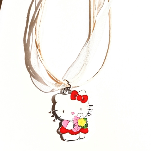Hello Kitty Holding Flower Bouquet Wearing Red Dress Ribbon Necklace - Picture 4 of 7
